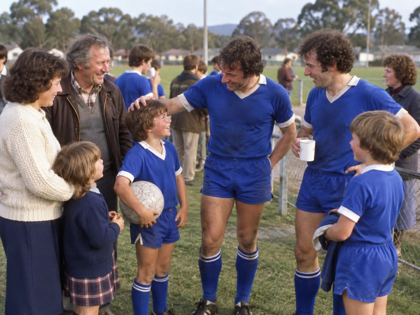 Colour interpretive scene of Morwell Falcons players encouraging local junior footballers